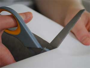 Scissors Cutting Vinyl Tile